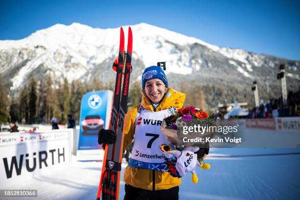 Franziska Preuss of Germany looks on after the medal ceremony the Women 10 km Pursuit at the BMW IBU World Cup Biathlon Lenzerheide on December 16,...