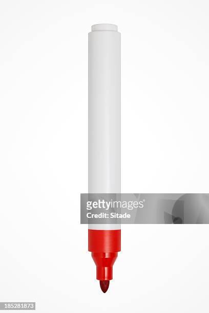 red felt tip pen on white background - färgpenna bildbanksfoton och bilder