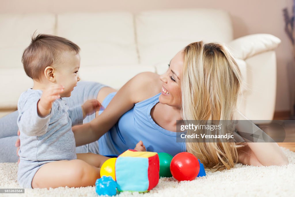 Mother and baby enjoying play time together