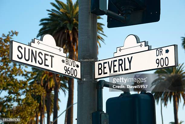 sunset blvd and beverly dr intersection sign - beverly hills sign stock pictures, royalty-free photos & images