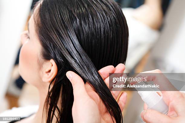 hair salon treatment - women washing hair stock pictures, royalty-free photos & images