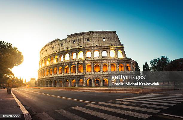 colosseum in rome, italy at sunrise - coliseum stock pictures, royalty-free photos & images