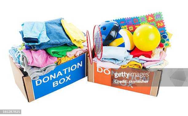 donation boxes full of clothes and toys. - donation box white background stock pictures, royalty-free photos & images