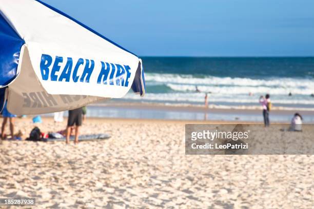 beach umbrella - manly beach stock pictures, royalty-free photos & images