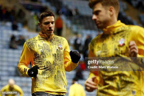 Jan Bednarek of Southampton warms up ahead of the Sky Bet Championship match between Coventry City and Southampton FC at The Coventry Building...