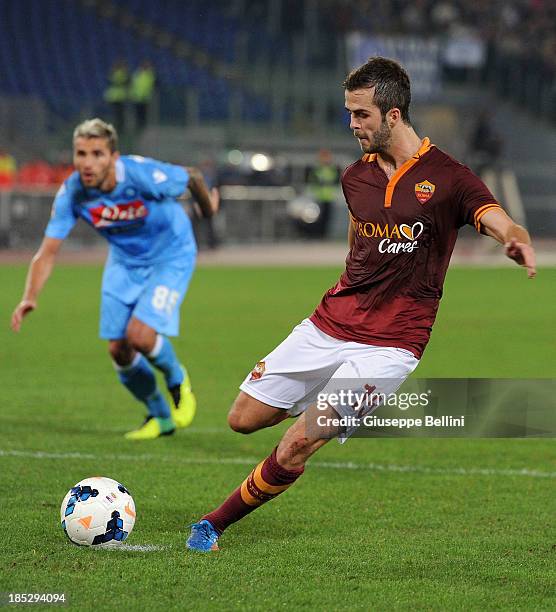 Miralem Pjanic of Roma kicks from the penalty spot to score his team's second goal during the Serie A match between AS Roma and SSC Napoli at Stadio...