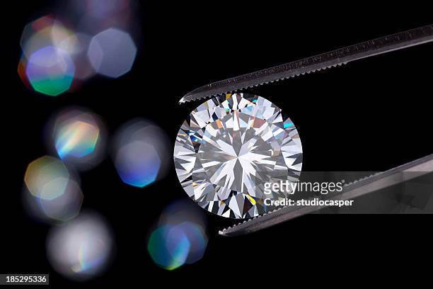 joyas de diamante retención - diamond fotografías e imágenes de stock