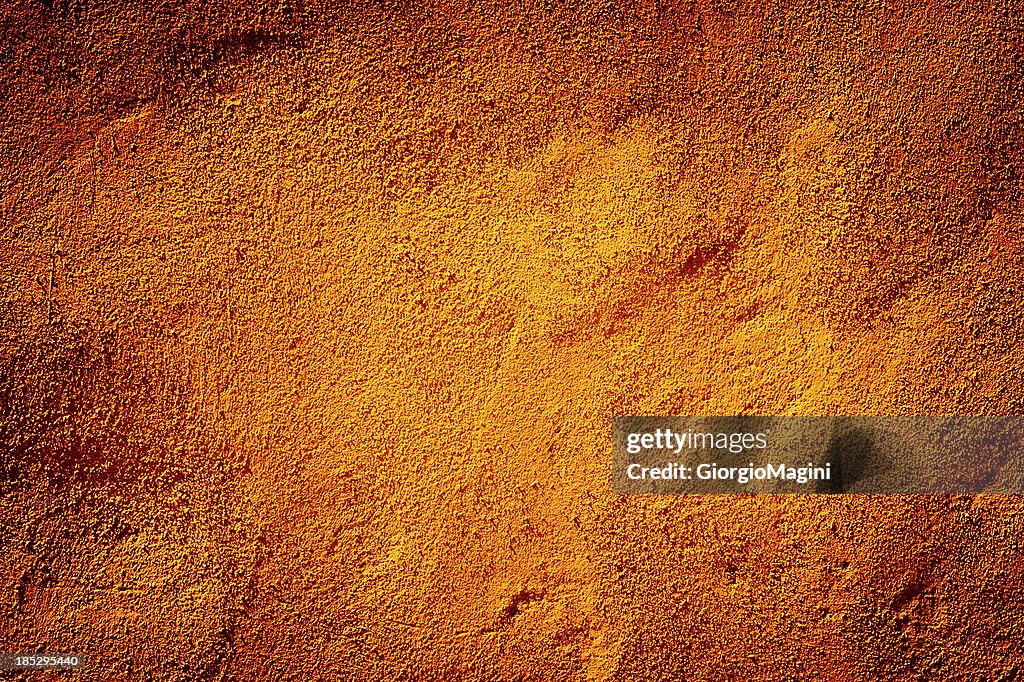 Amarelo escuro, textura de fundo de gesso parede