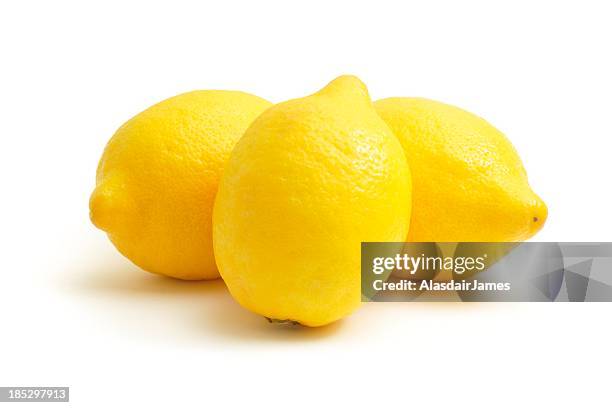 three lemons - lemon stock pictures, royalty-free photos & images