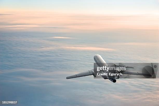 sunrise journey - plane flying stock pictures, royalty-free photos & images