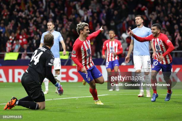 Antoine Griezmann of Atletico Madrid celebrates after scoring their team's first goal during the UEFA Champions League match between Atletico Madrid...