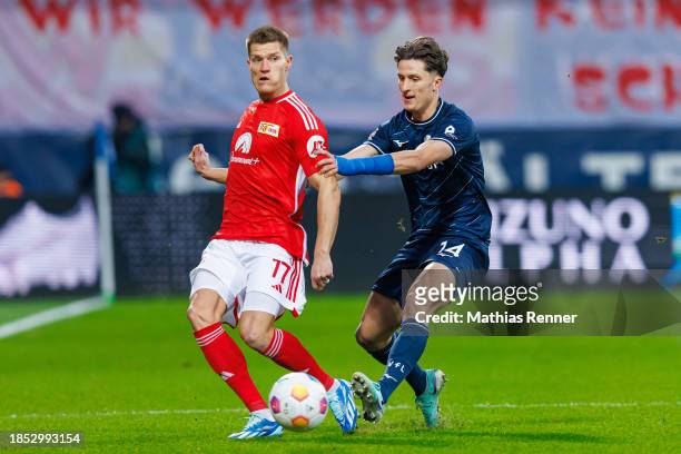 Kevin Behrens of 1 FC Union Berlin before Tim Oermann of VfL Bochum during the match between dem 1 FC Union Berlin and VfL Bochum on December 16,...