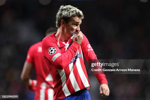 Antoine Griezmann of Atletico Madrid celebrates after scoring their team's first goal during the UEFA Champions League match between Atletico Madrid...