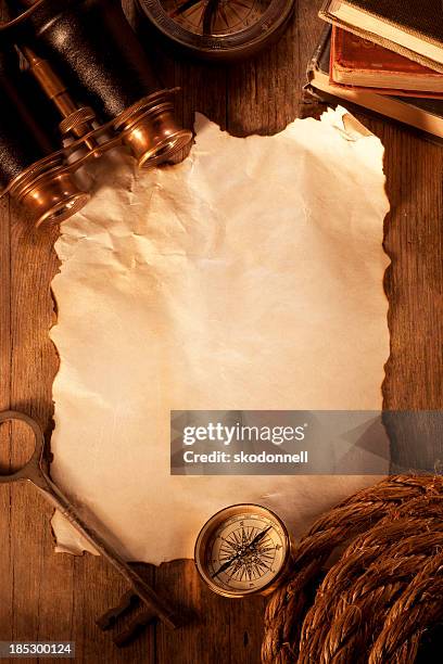 antique paper on a wooden desk - parchment paper scroll stock pictures, royalty-free photos & images