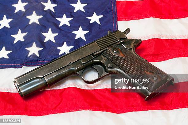 govt issue 1911 on us flag - american flag gun stock pictures, royalty-free photos & images