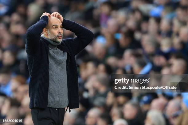 Manchester City manager Pep Guardiola looks dejected during the Premier League match between Manchester City and Crystal Palace at Etihad Stadium on...