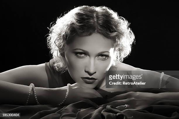 film noir style.diva with necklace - a la moda stock pictures, royalty-free photos & images