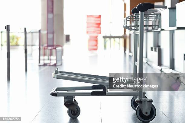 luggage trolley at the airport - luggage trolley stock pictures, royalty-free photos & images