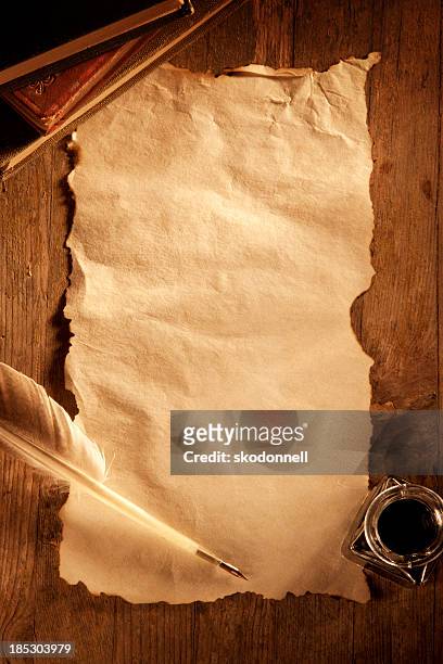 antique paper on a wooden desk - ancient stock pictures, royalty-free photos & images