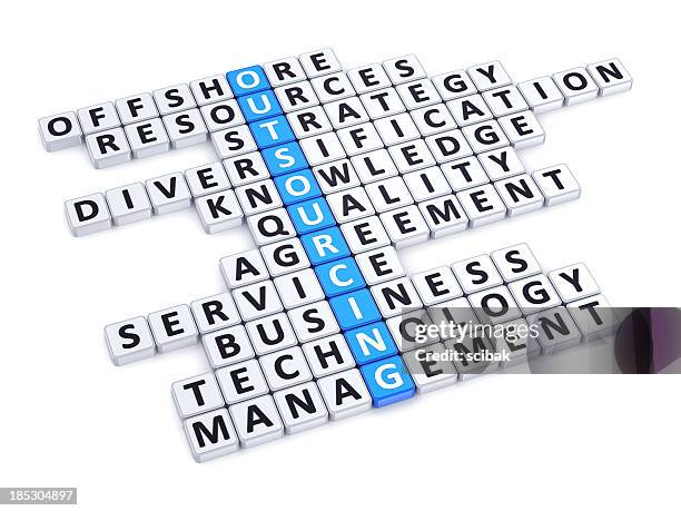 outsourcing crossword - word game stock pictures, royalty-free photos & images