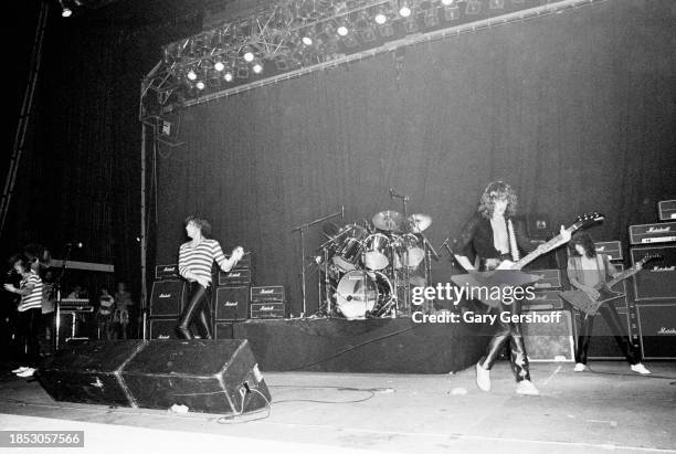 Members of the English Rock group Def Leppard perform onstage at the Palladium, New York, New York, August 1, 1980. Pictured are, from left, Steve...