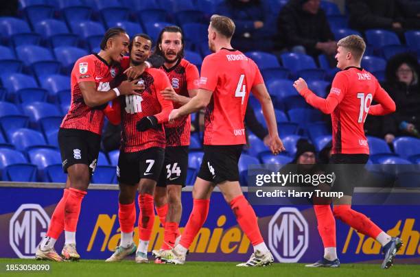 Juninho Bacuna of Birmingham City celebrates after scoring their sides first goal during the Sky Bet Championship match between Cardiff City and...