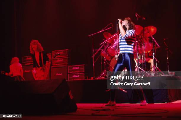 Members of the English Rock group Def Leppard perform onstage at the Palladium, New York, New York, August 1, 1980. Pictured are, from left, Steve...