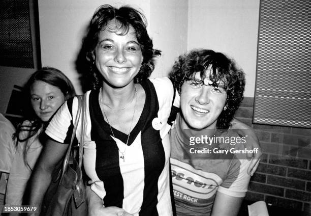 Mercury Records publicist Sherry Ring and English singer Joe Elliott, of the group Def Leppard, pose backstage at the Palladium, New York, New York,...