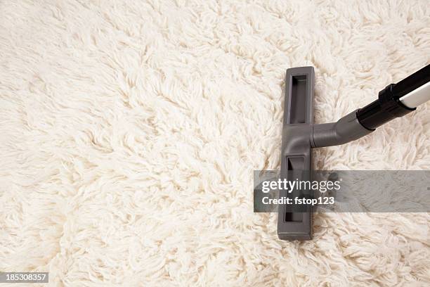 vacuum cleaner nozzle on shag carpet - clean carpet stock pictures, royalty-free photos & images
