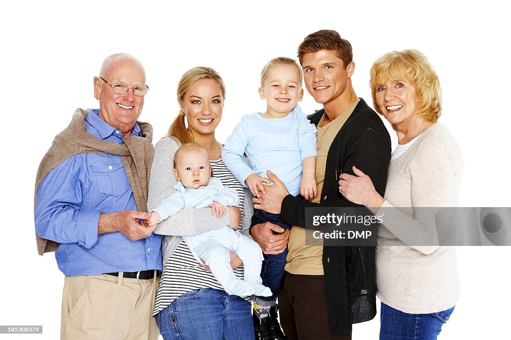 Smiling happy family isolated on white