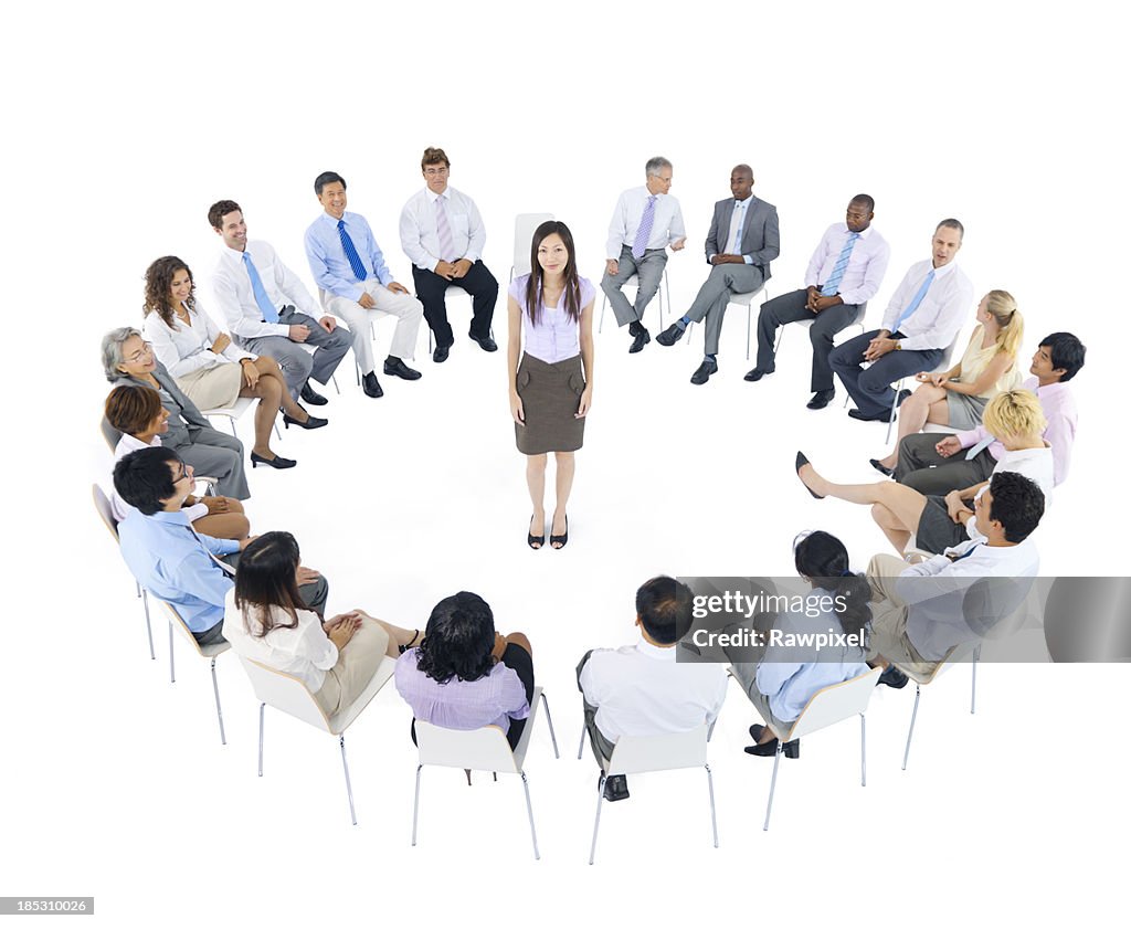 Individuality. Female business person presenting to a group