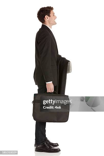 ビジネスマン、ブリーフケース付き - オーバーコート ストックフォトと画像