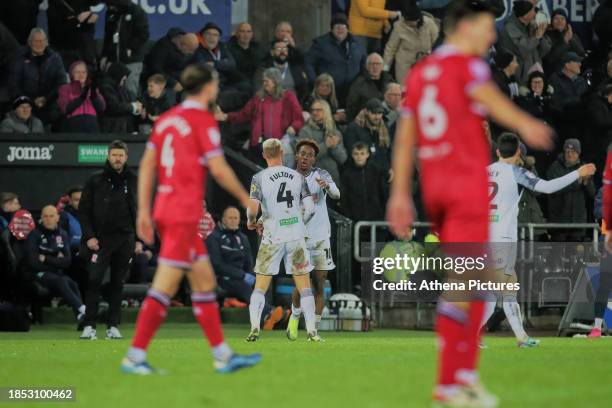 Jamal Lowe of Swansea City celebrates his goal with Jay Fulton during the Sky Bet Championship match between Swansea City and Middlesbrough at the...