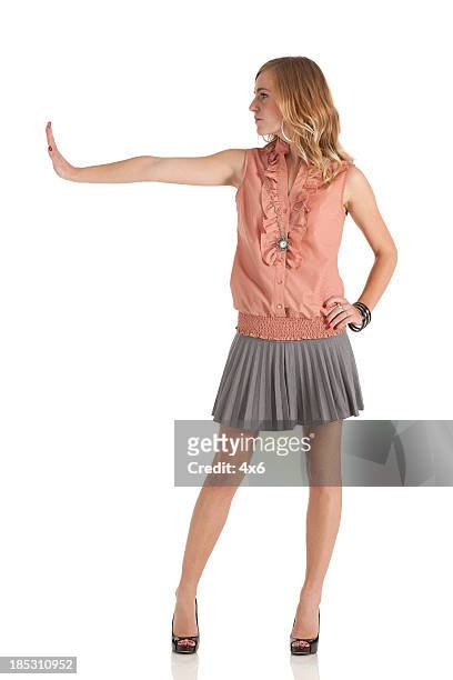 beautiful woman posing - stop - stop enkel woord stockfoto's en -beelden