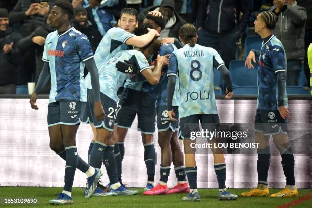 Le Havre's players celebrate after scoring their second goal during the French L1 football match between Le Havre AC and OGC Nice at The Stade Oceane...