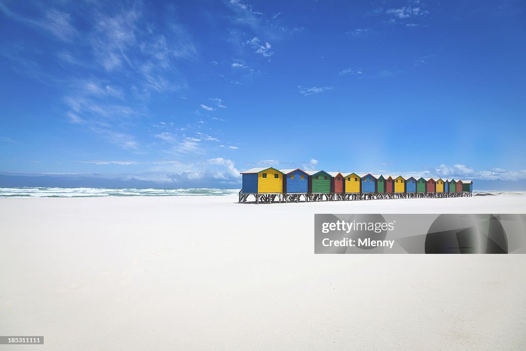 Beautiful white sandy beach with colorful huts