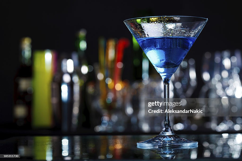 Blue curacao cocktails on a bar counter