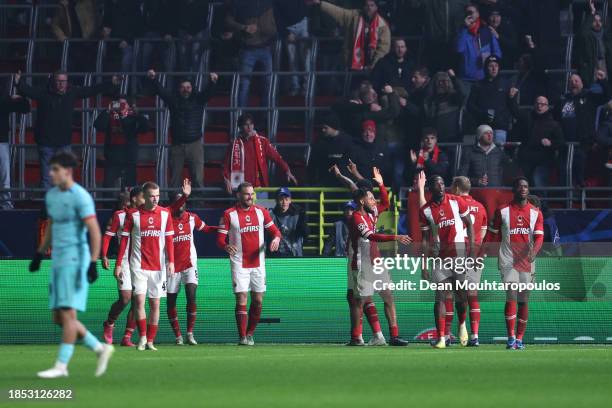 Vincent Janssen of Royal Antwerp celebrates with teammates after scoring their team's second goal during the UEFA Champions League match between...