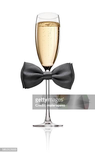 glas champagner mit schleife - bow tie stock-fotos und bilder