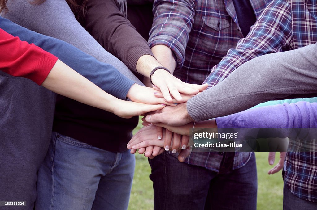 Stack Of Hands.Young People Unity.