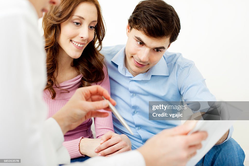 Couple Meeting With Financial Advisor.