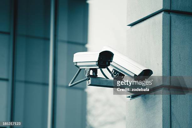 cctv security surveillance camera - guarding stock pictures, royalty-free photos & images