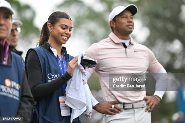 Tiger Woods and daughter, Sam Woods, stand together on the first tee box during the first round of the PNC Championship at Ritz-Carlton Golf Club on...