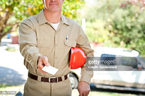 repairman in uniform & hard hat - business card blank stock pictures, royalty-free photos & images
