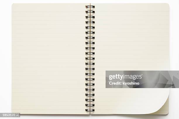 isolated shot of opened spiral notebook on white background - lijntjespapier stockfoto's en -beelden