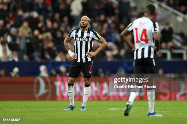 Joelinton of Newcastle United looks dejected after Samuel Chukwueze of AC Milan scores their team's second goal during the UEFA Champions League...