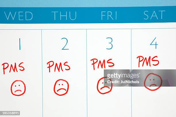 calendar: pms or menstruation cycle - pms stock pictures, royalty-free photos & images