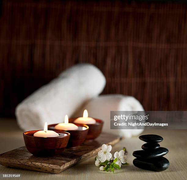 floating candles in a zen spa  -- xxl background - ayurveda stock pictures, royalty-free photos & images