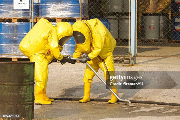 collecting dangerous goods - hazardous waste collection stock pictures, royalty-free photos & images