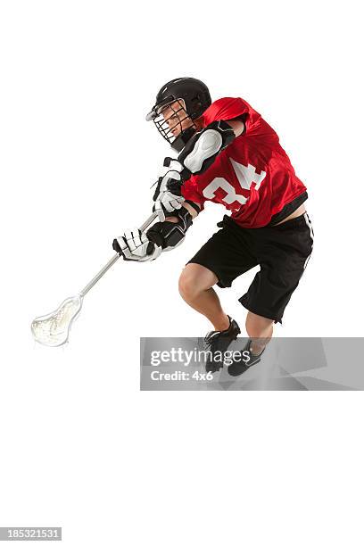 lacrosse player in action - crosier stock pictures, royalty-free photos & images